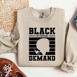 a sweater with a picture of a man's face and the words black is
