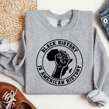a gray sweatshirt with a black history is american history on it