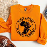 an orange sweatshirt with a black history is american hero on it