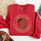 a red sweatshirt with a picture of a horse on it