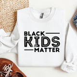 a white shirt that says black kids matter