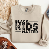 a sweater with the words black kids matter on it