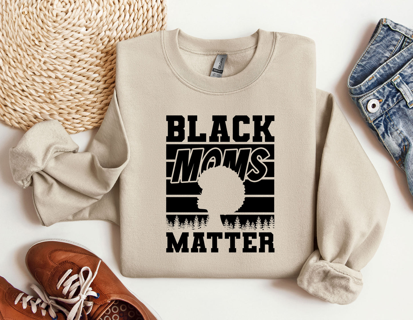 a sweater with the words black moms matter on it