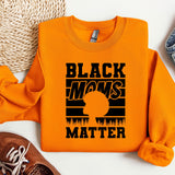 an orange shirt that says black moms matter