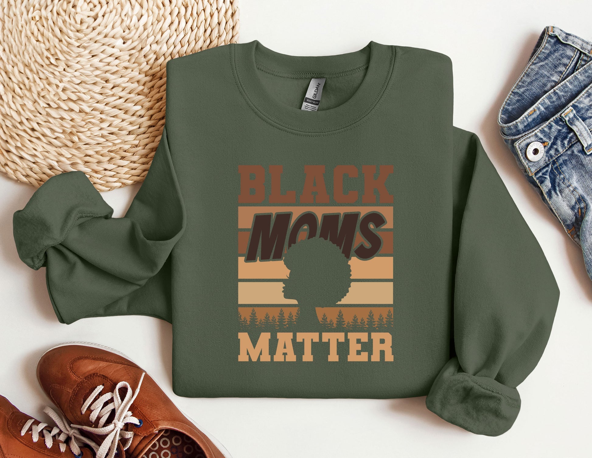 a green sweatshirt with the words black moms matter on it