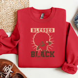a red shirt with a black design on it