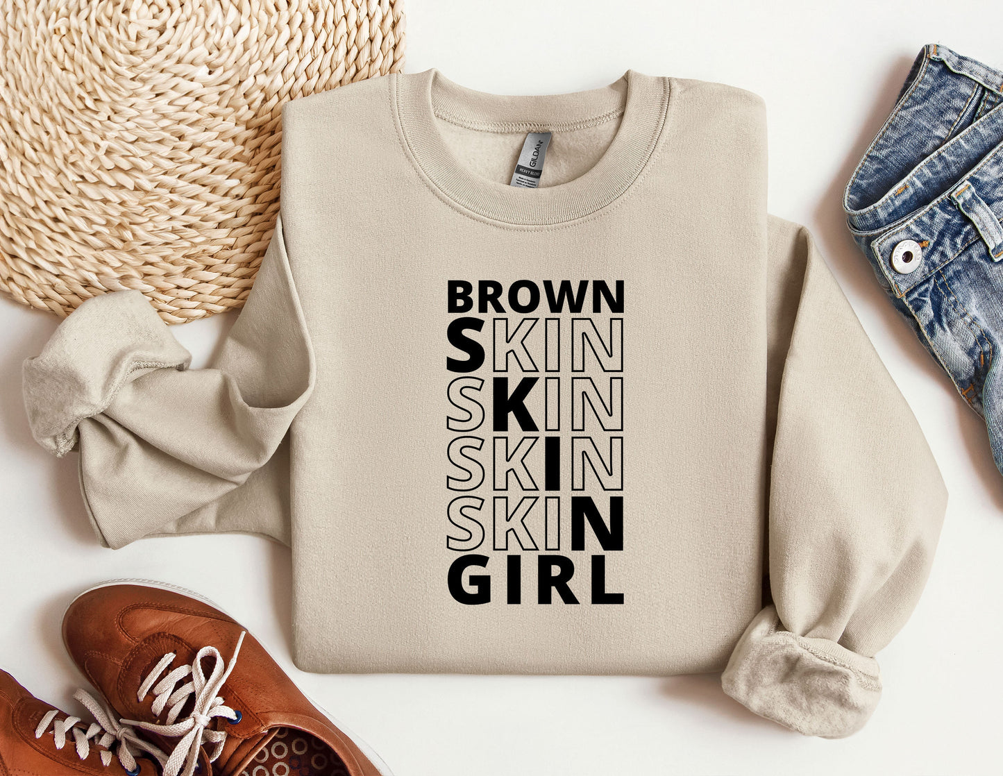 a sweater with the words brown skin skin skin skin girl on it