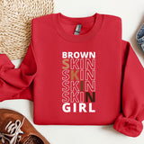 a red sweatshirt with the words brown skin skin skin skin girl on it