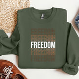 a green sweatshirt with the words freedom and a pair of sneakers