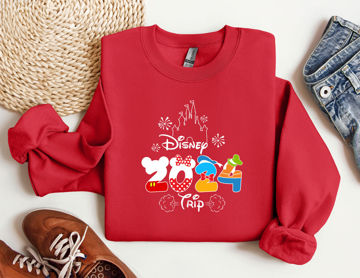 a red sweatshirt with mickey mouse on it