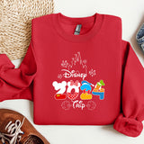 a red sweatshirt with mickey mouse on it