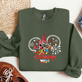a green sweatshirt with mickey mouse on it