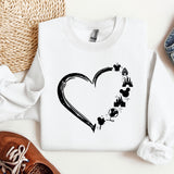 a white shirt with a black heart on it