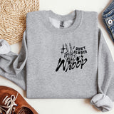 a grey sweatshirt with the words don't let the wind stop on it