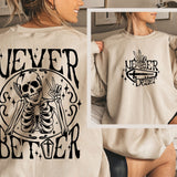 a woman wearing a sweater with a skeleton on it