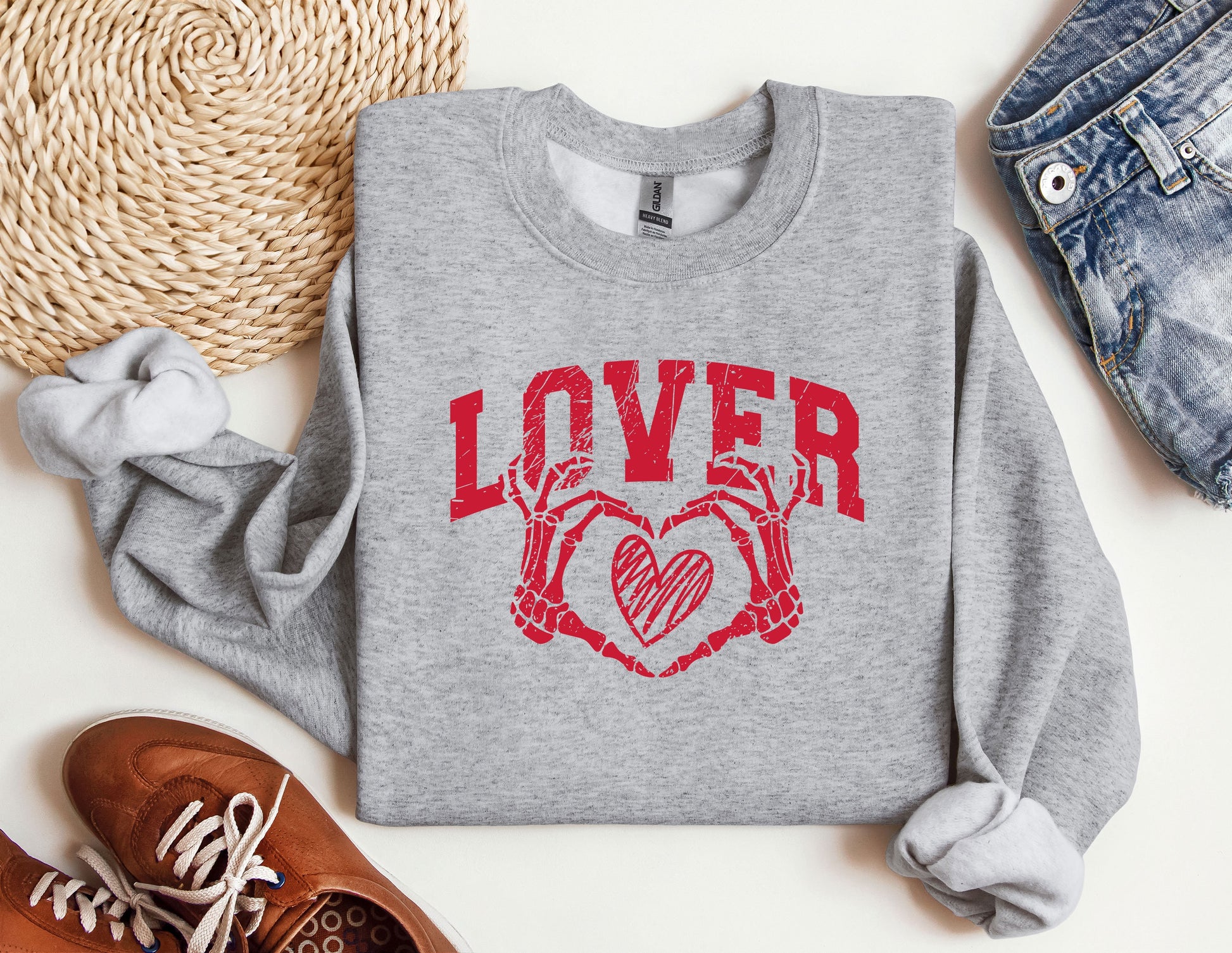 a sweater with the word lover printed on it