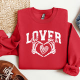 a red sweatshirt with a heart and two crossed arms