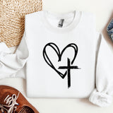 a white shirt with a heart and cross drawn on it