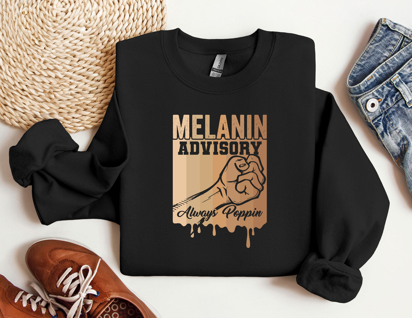 a black sweatshirt with the slogan melanin advisory on it