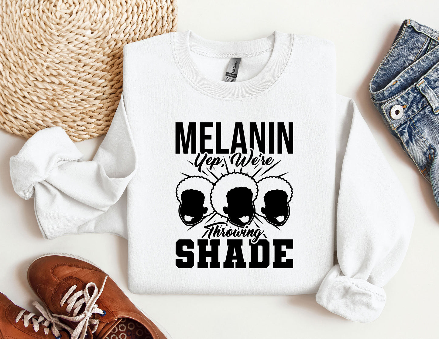 a white sweatshirt with the words melanin on it