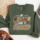 a green sweatshirt that says, my heannn game is strong