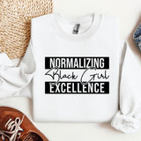 a white shirt that says normalizing black and white excellence