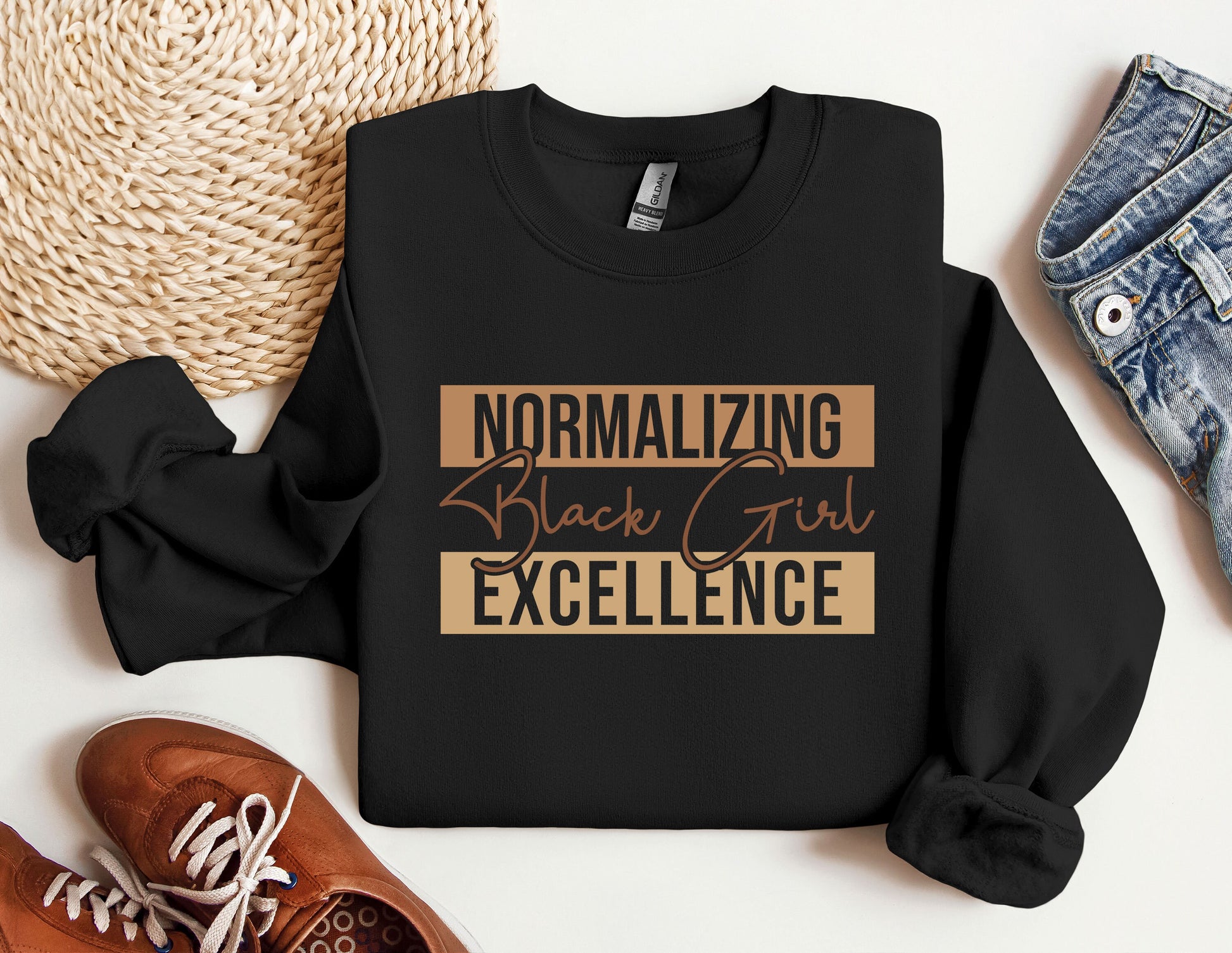 a black shirt that says normalizing black girl excellence