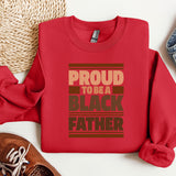 a red shirt that says proud to be a black father