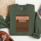 a green sweatshirt that says proud to be a black father
