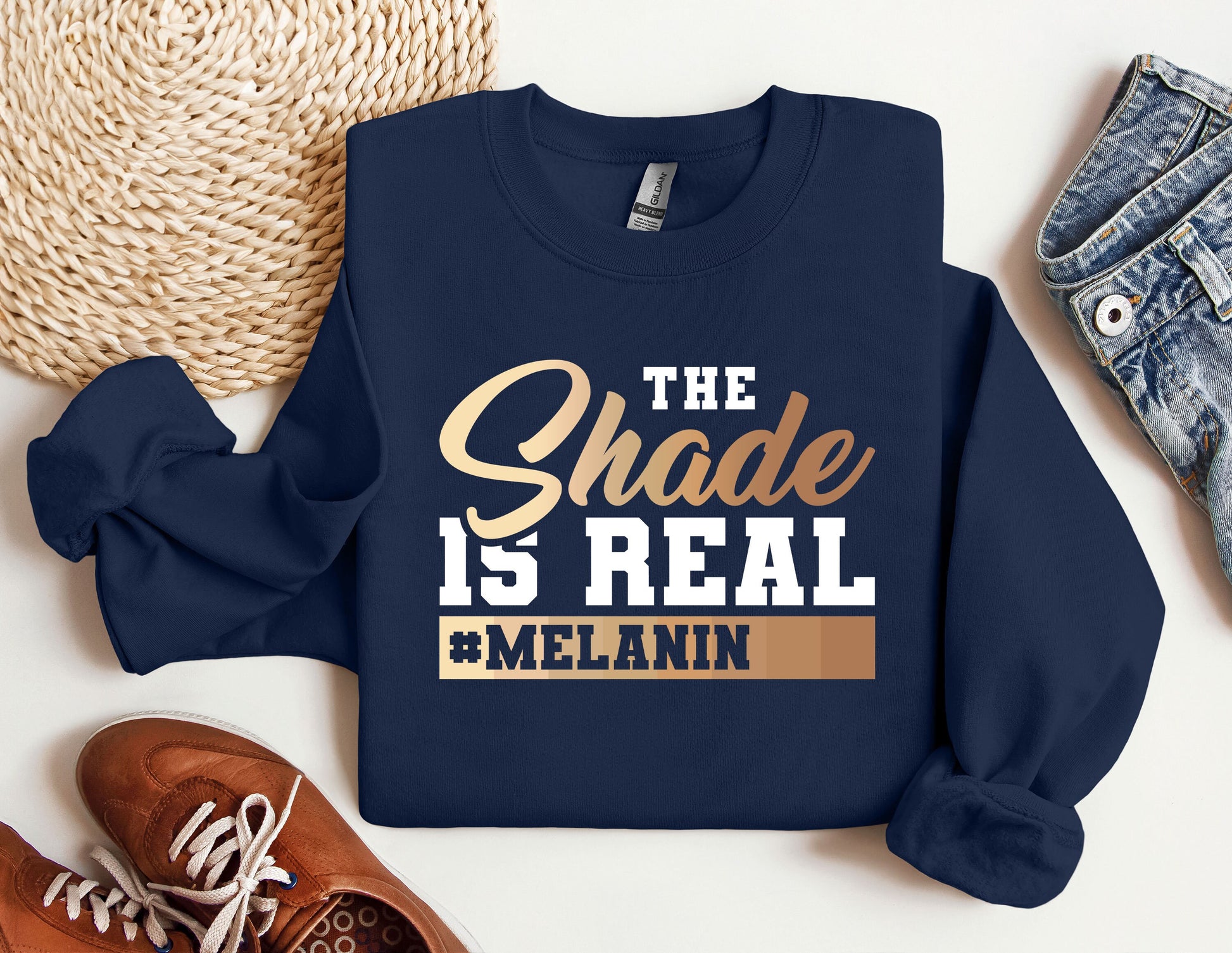 a sweatshirt that says the shade is real and melanin