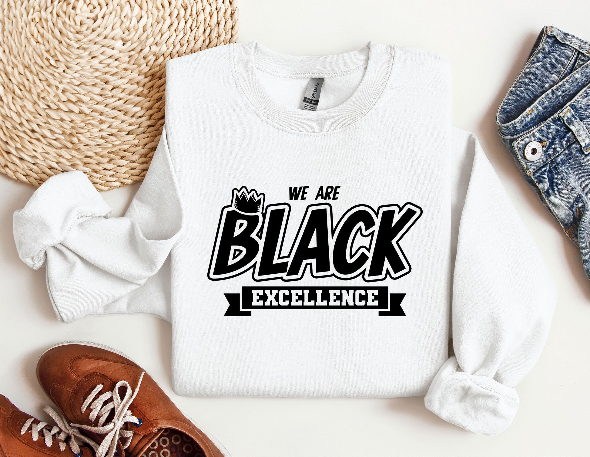 a white sweatshirt with we are black excellence on it