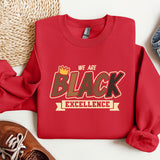 a red sweatshirt with we are black excellence on it