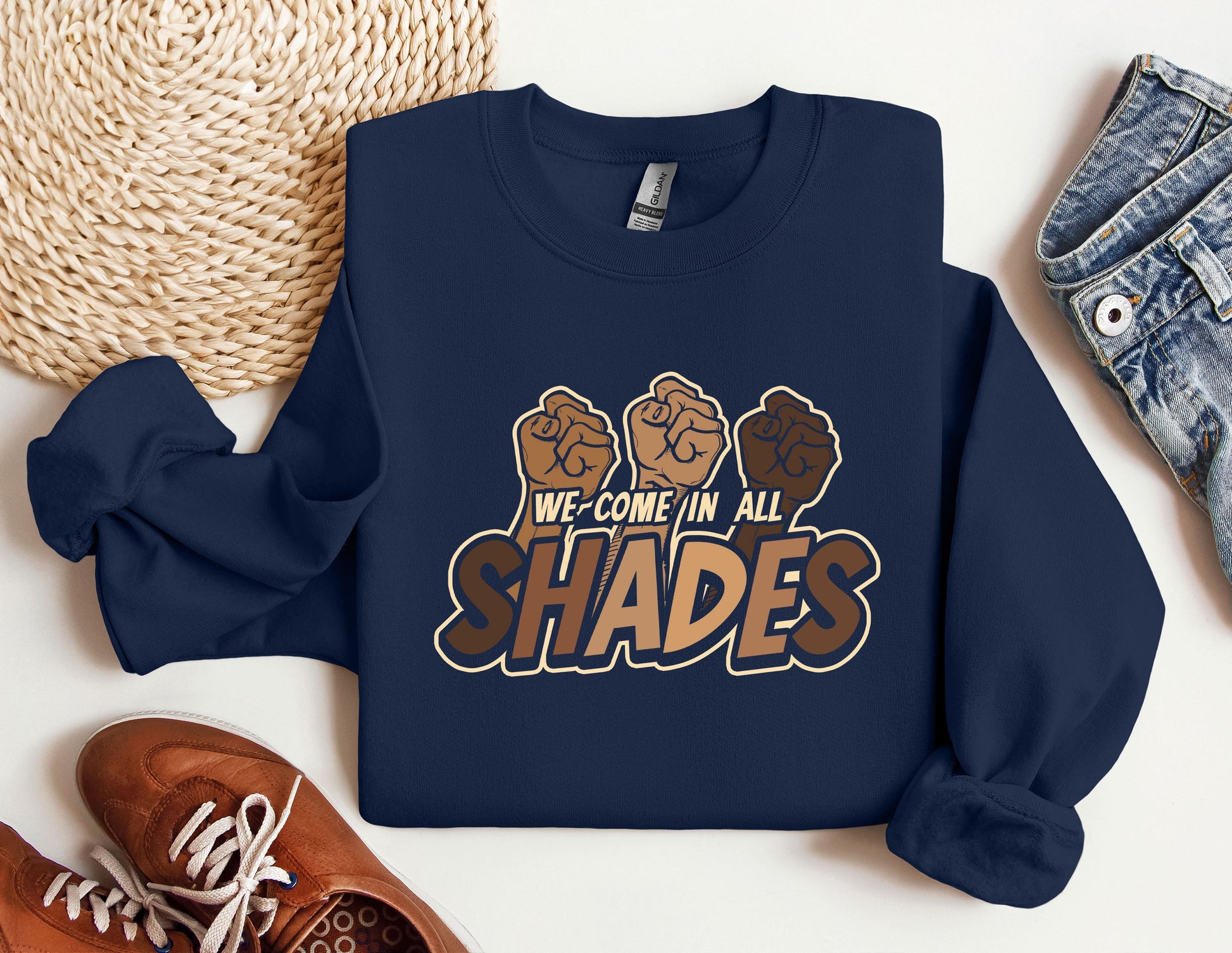 a sweatshirt with the words we come in all shades printed on it