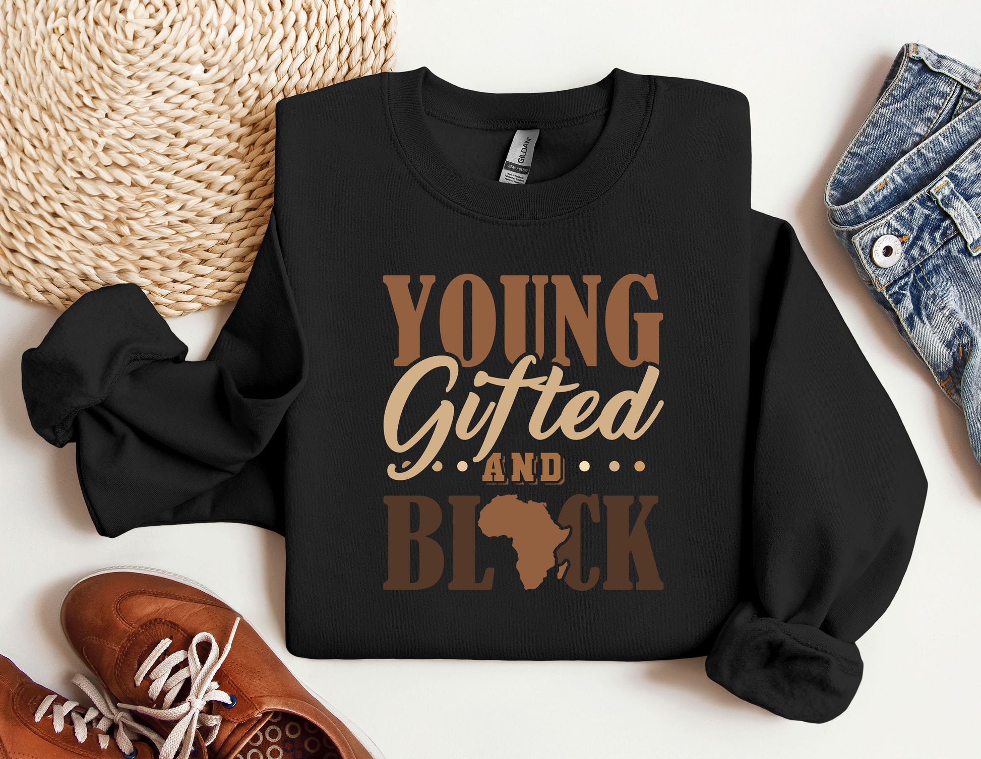 a black shirt with the words young, gifted and black on it