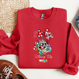 a red sweatshirt with mickey mouse on it