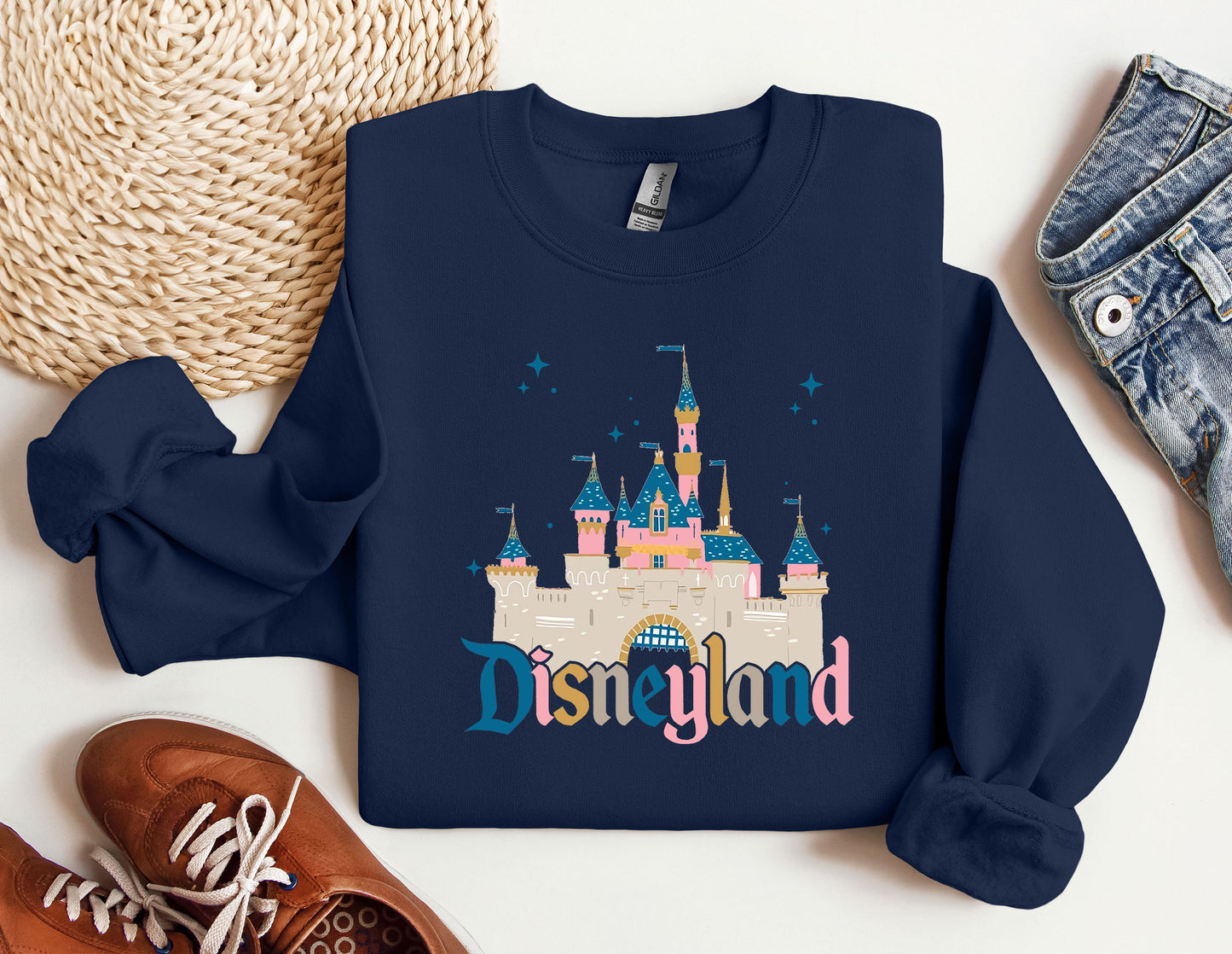 a sweatshirt with the word disneyland printed on it