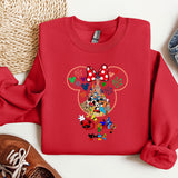 a red sweatshirt with mickey mouse on it
