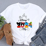 a white shirt with mickey mouse on it