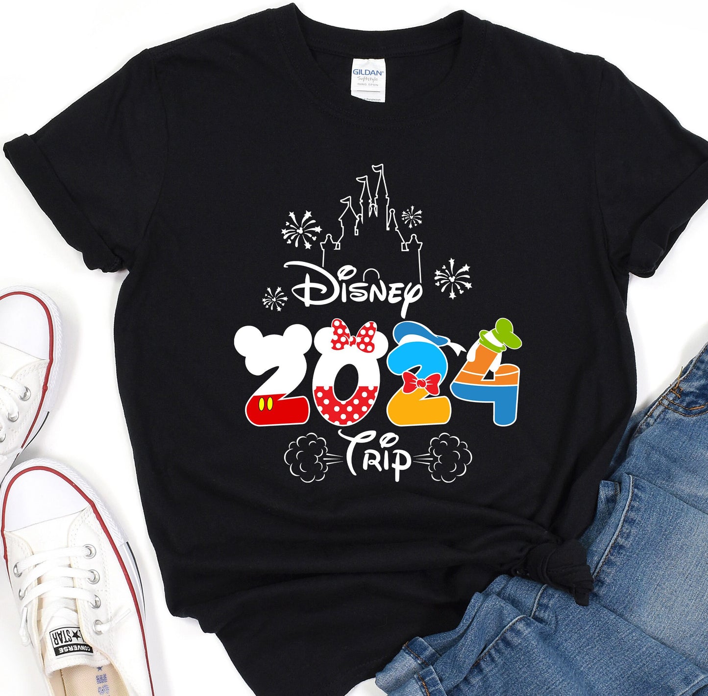 a black tshirt with mickey mouse and mickey mouse on it