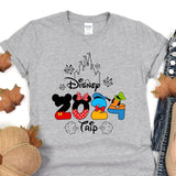 a gray shirt with mickey mouse on it