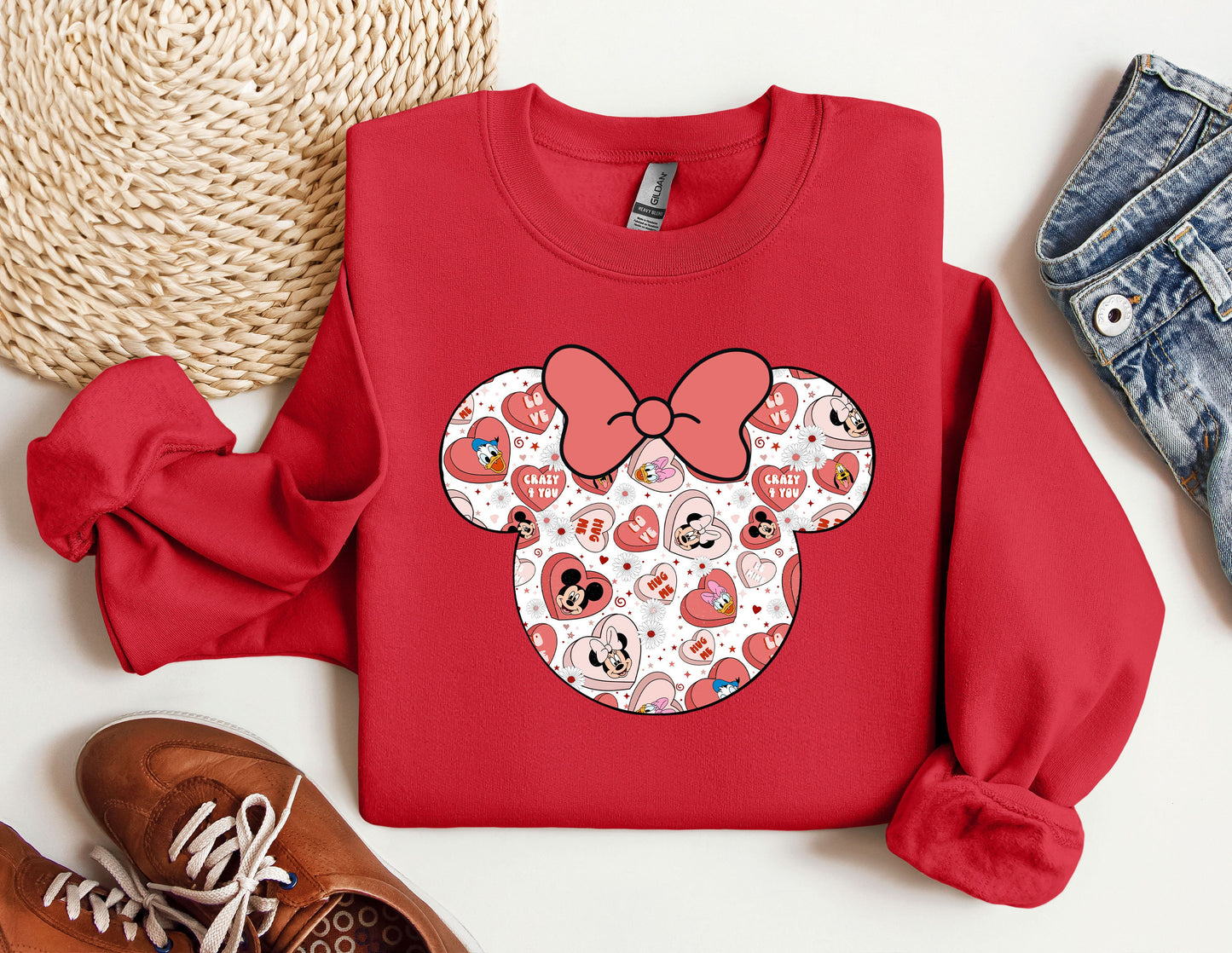 a red shirt with a minnie mouse design on it