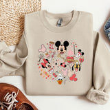 a sweater with a mickey mouse design on it