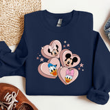 a blue sweatshirt with mickey and minnie mouses on it