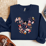 a mickey mouse shirt with a mickey mouse design on it