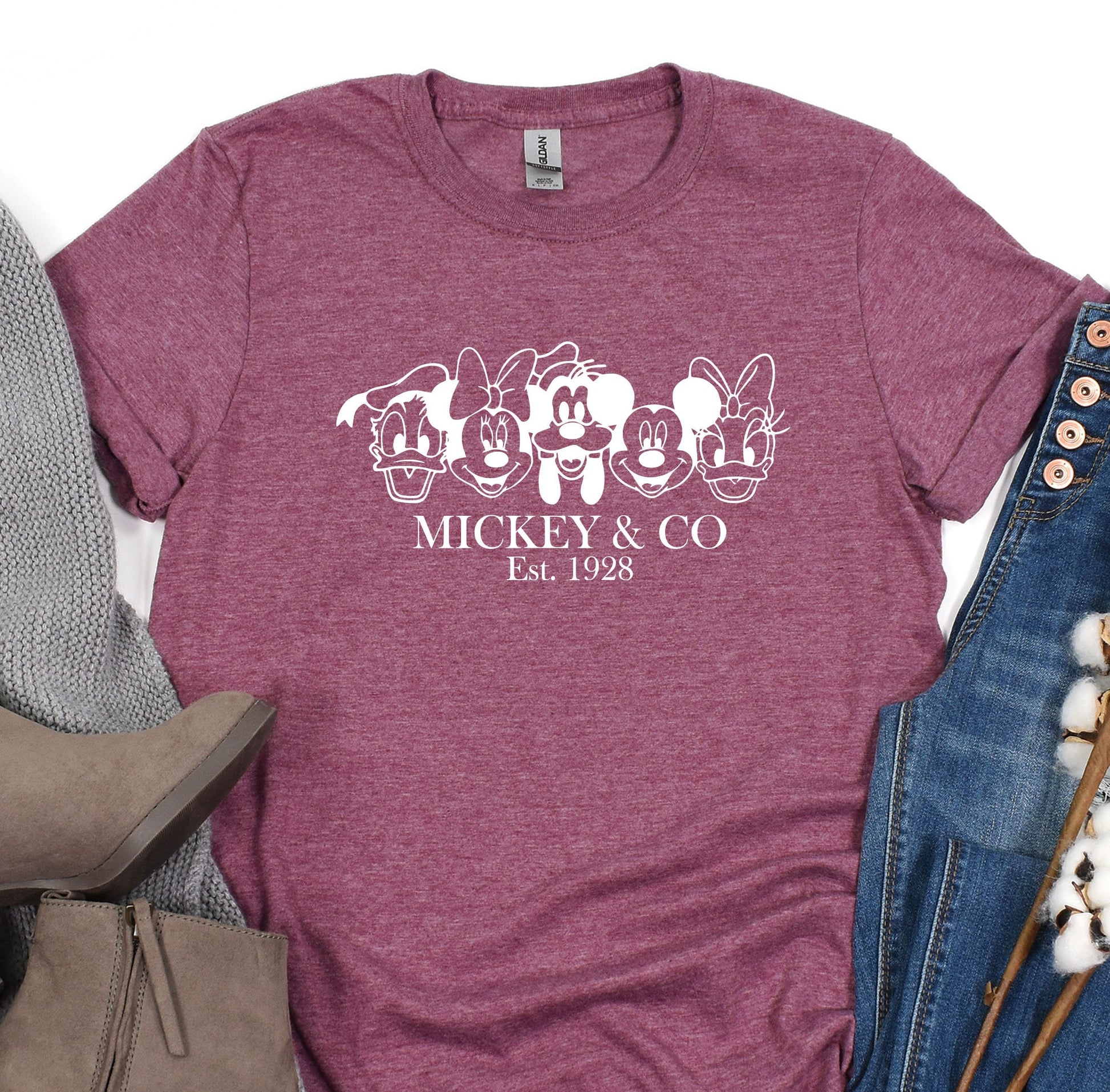 a t - shirt that says mickey and co on it