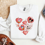 a pair of shoes and a mickey mouse sweatshirt