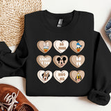 a black shirt with mickey mouse hearts on it