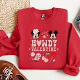a red sweatshirt with mickey and minnie mouses on it