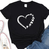 a t - shirt with a heart and flowers on it