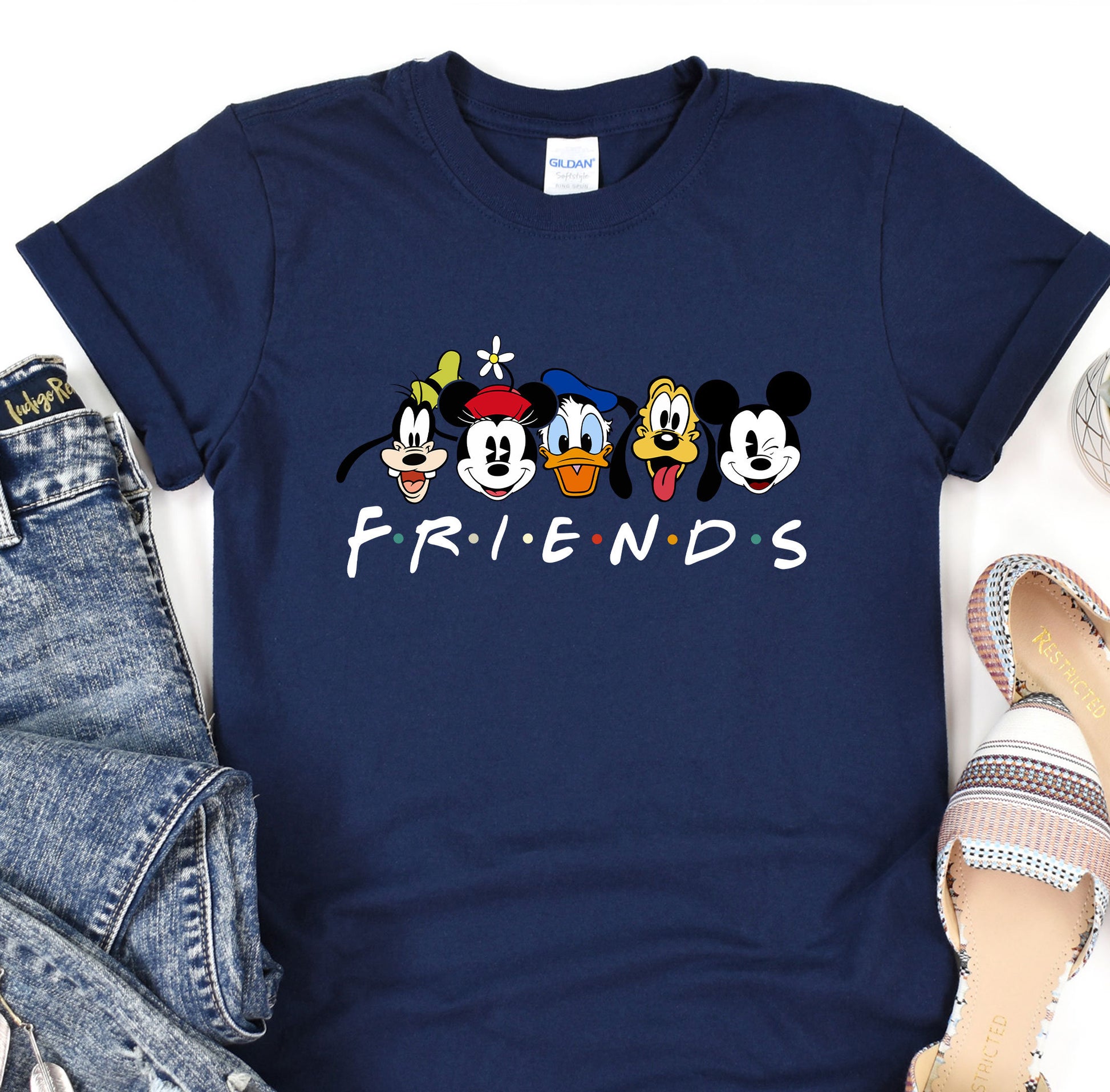 a t - shirt with mickey mouse and friends on it